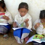 Lao_schoolgirls_reading_books